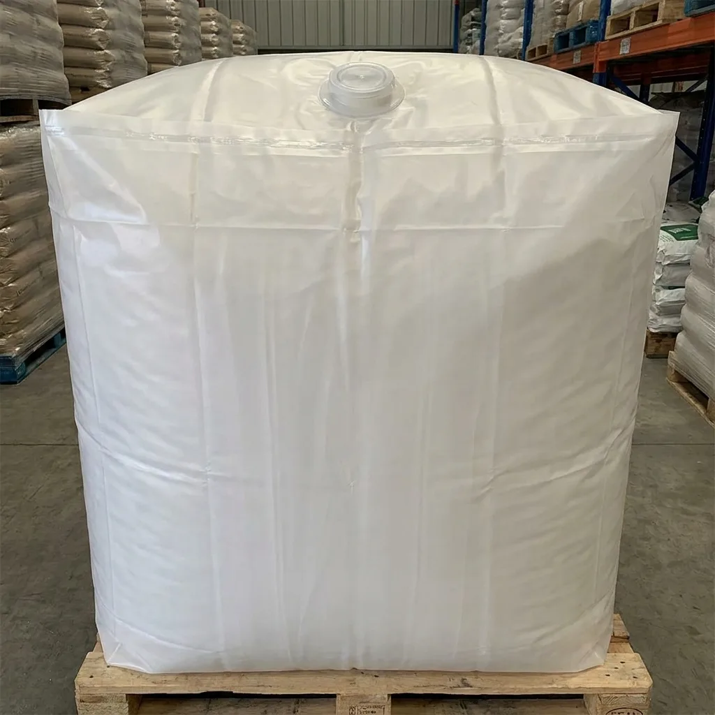 Bulk bag with an EVOH barrier liner, filled and closed at the spout
